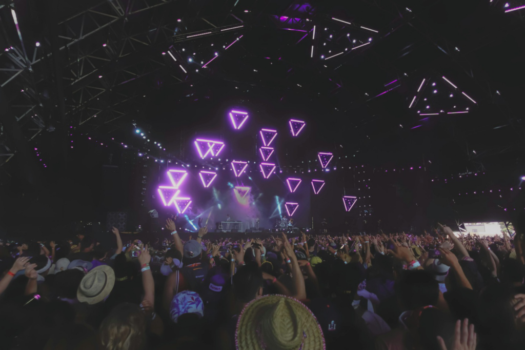   A crowd in front of a stage at Coachella 