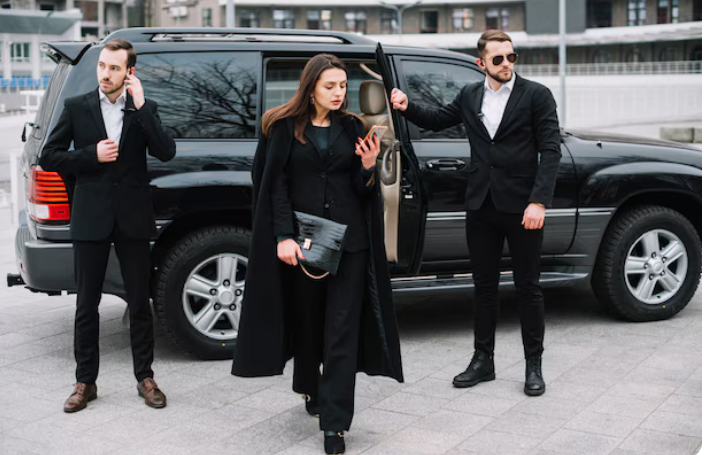 Chauffeur opening luxury car door for Stagecoach private car service client