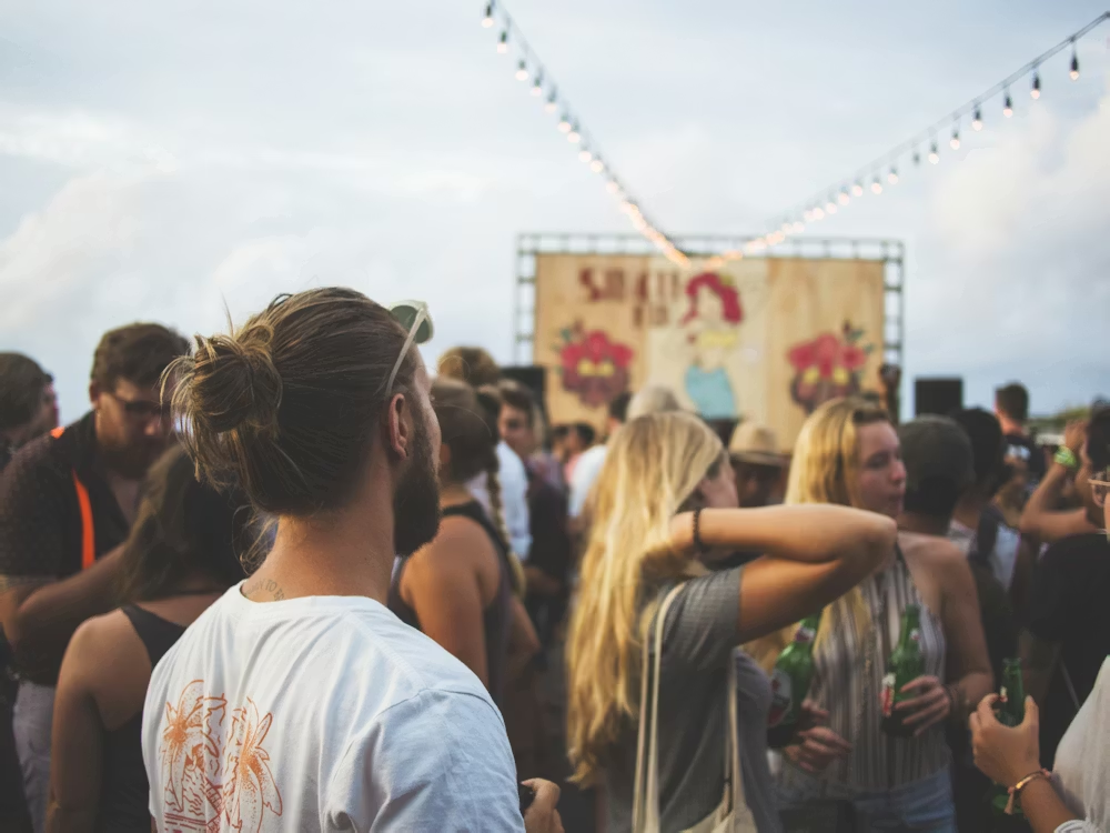  People standing in a crowd at Coachella