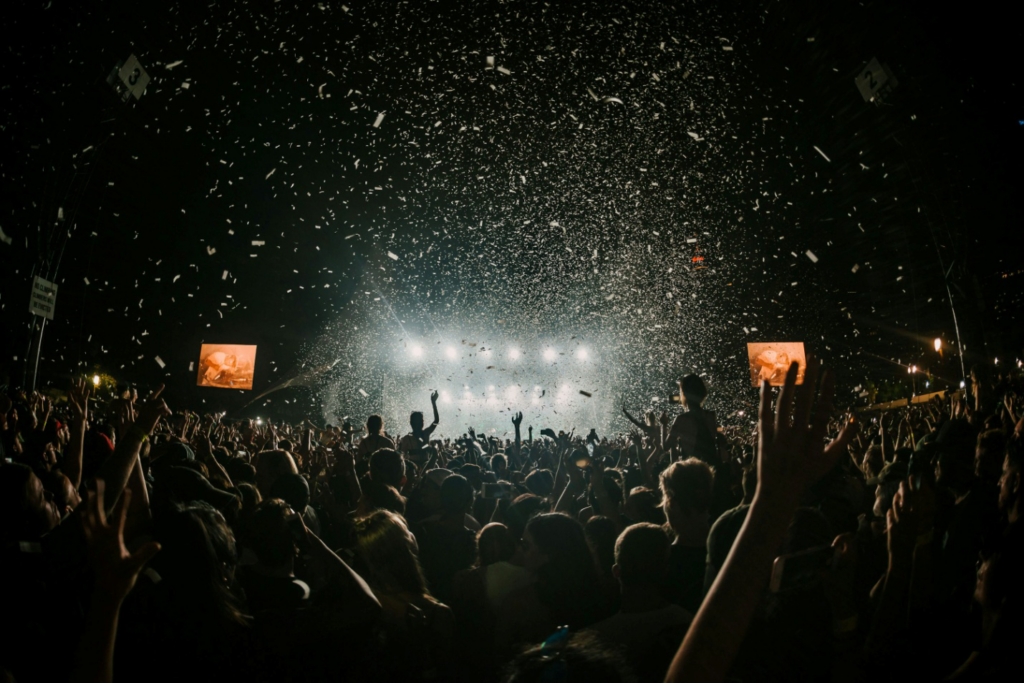 A crowd of people at a Coachella concert
