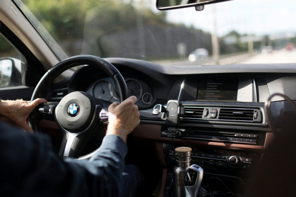 A man driving a car